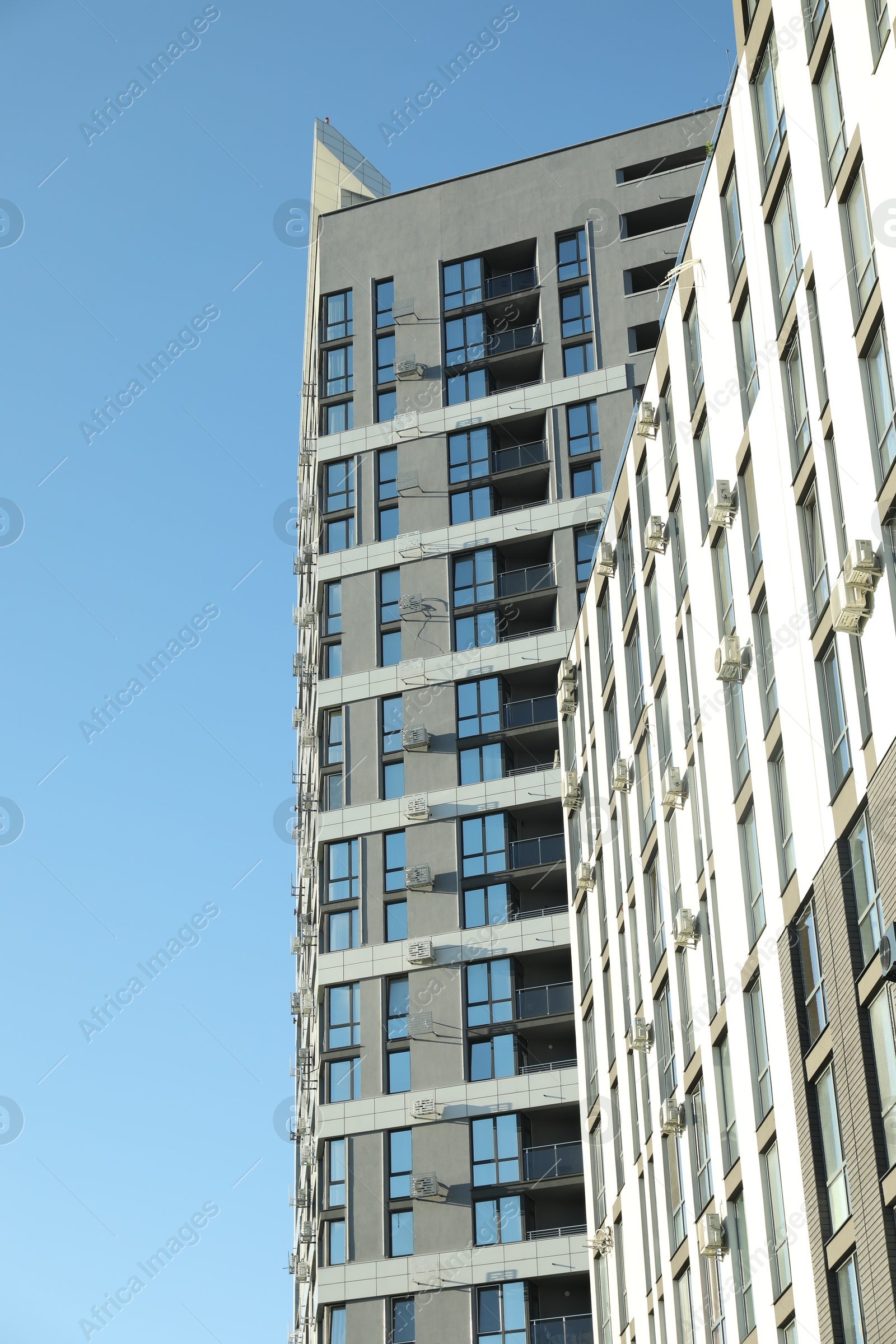 Photo of Exterior of modern building against blue sky