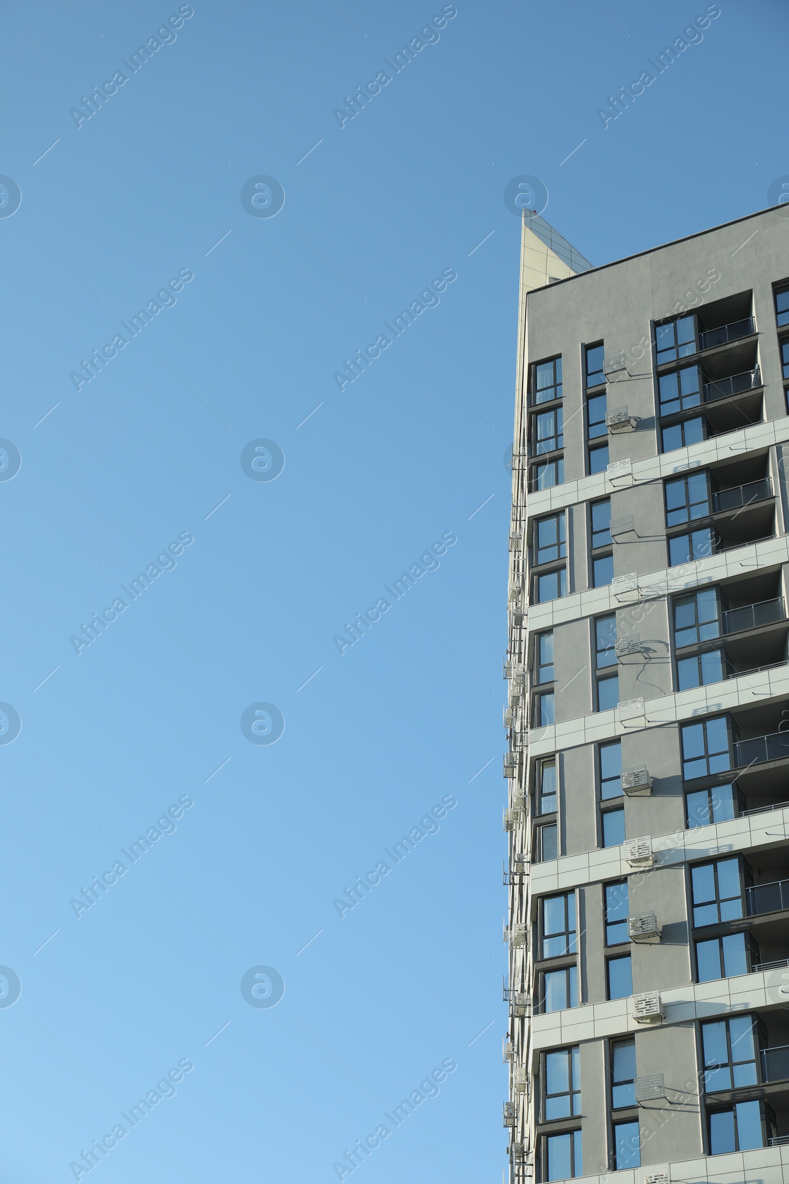 Photo of Exterior of modern building against blue sky