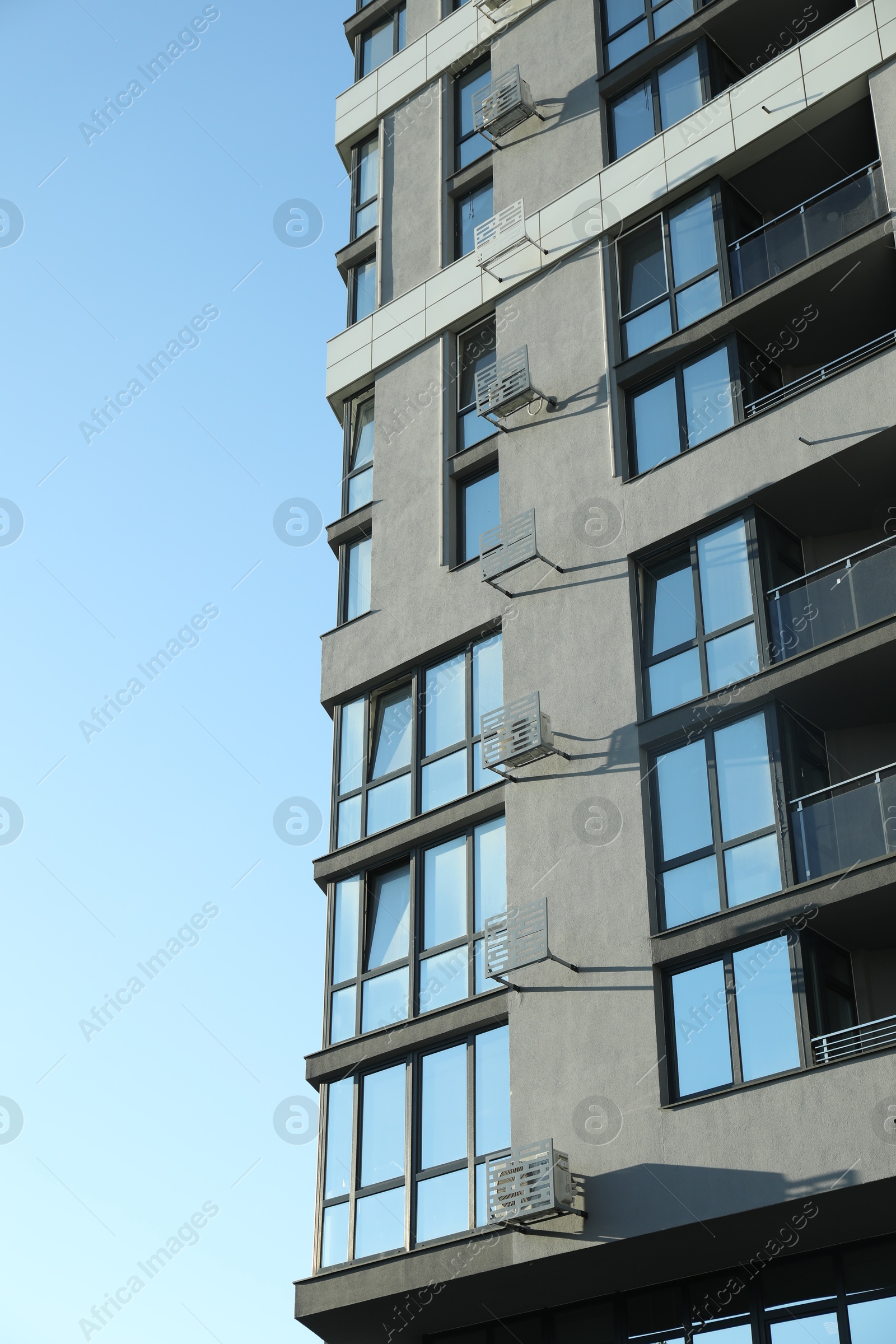 Photo of Exterior of modern building against blue sky