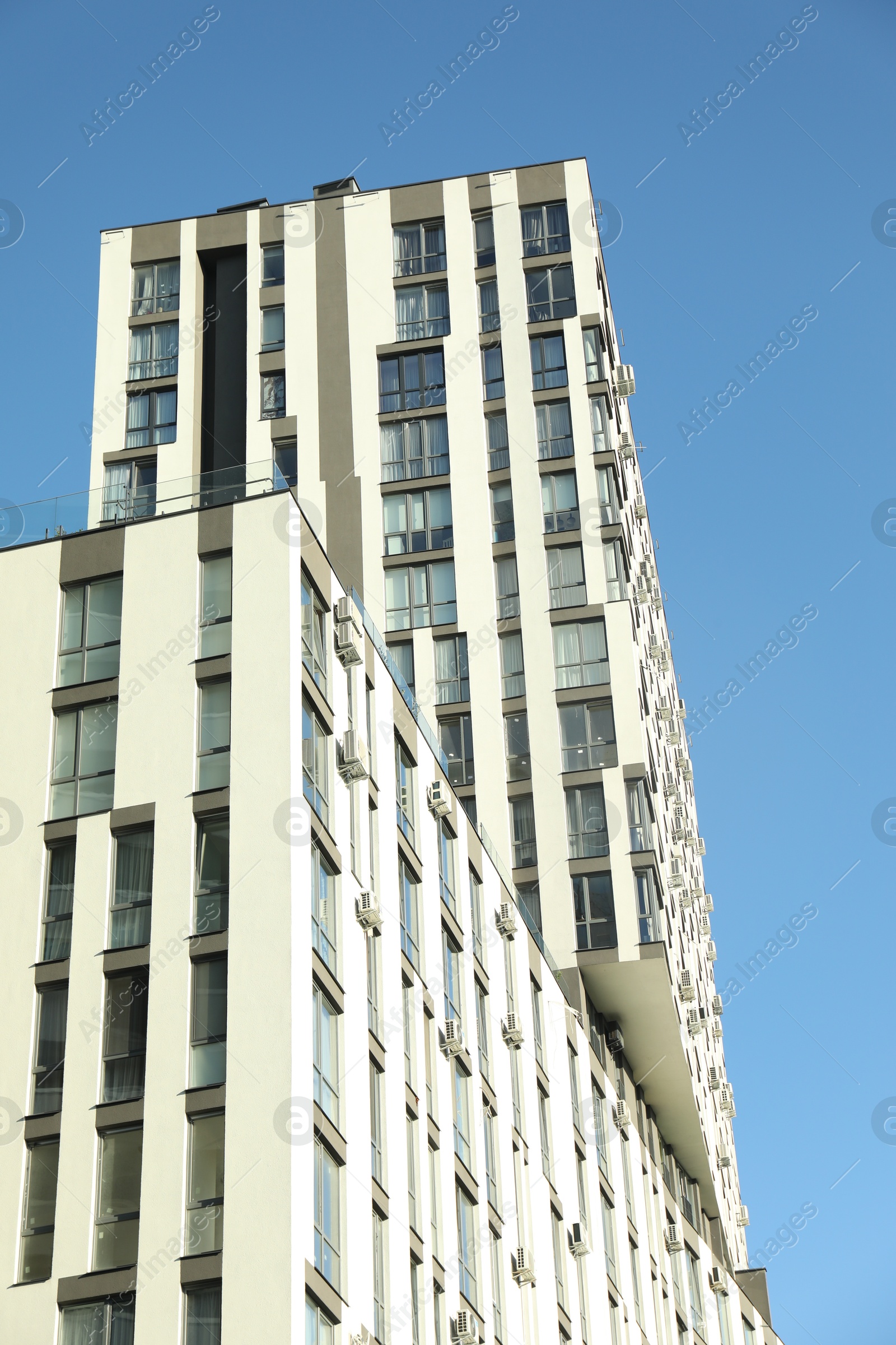 Photo of Exterior of modern building against blue sky