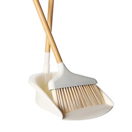 Photo of Broom and dustpan isolated on white. Cleaning tools