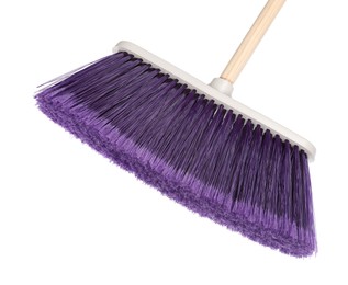 One broom isolated on white. Cleaning tool