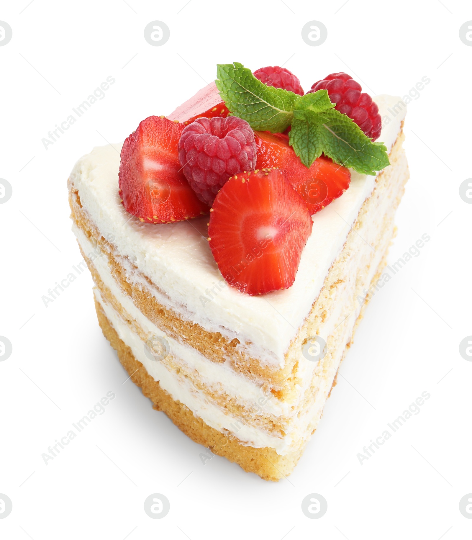 Photo of Piece of tasty sponge cake with fresh berries and mint isolated on white