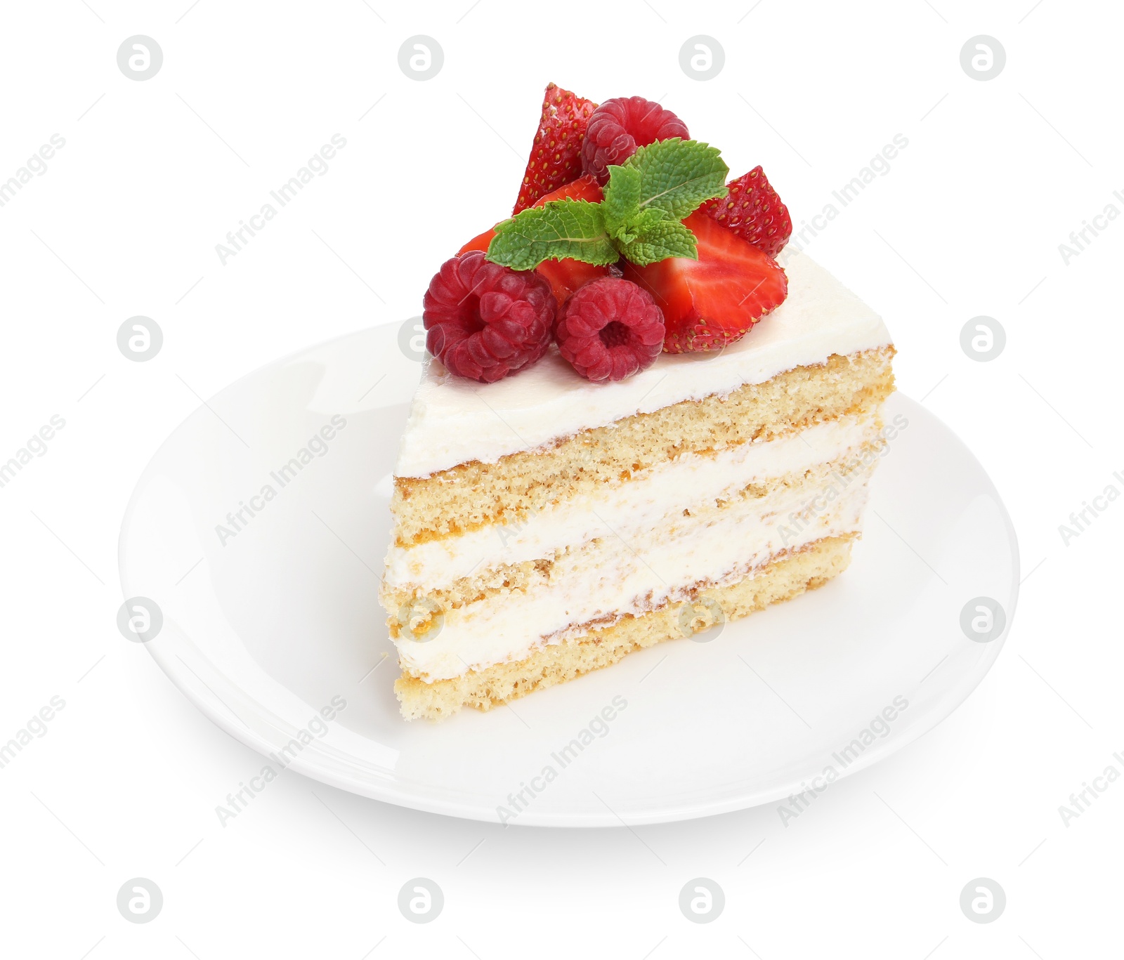 Photo of Piece of tasty sponge cake with fresh berries and mint isolated on white