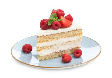 Piece of tasty sponge cake with fresh berries and mint isolated on white