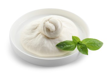 Photo of Plate with fresh burrata cheese and basil leaves isolated on white