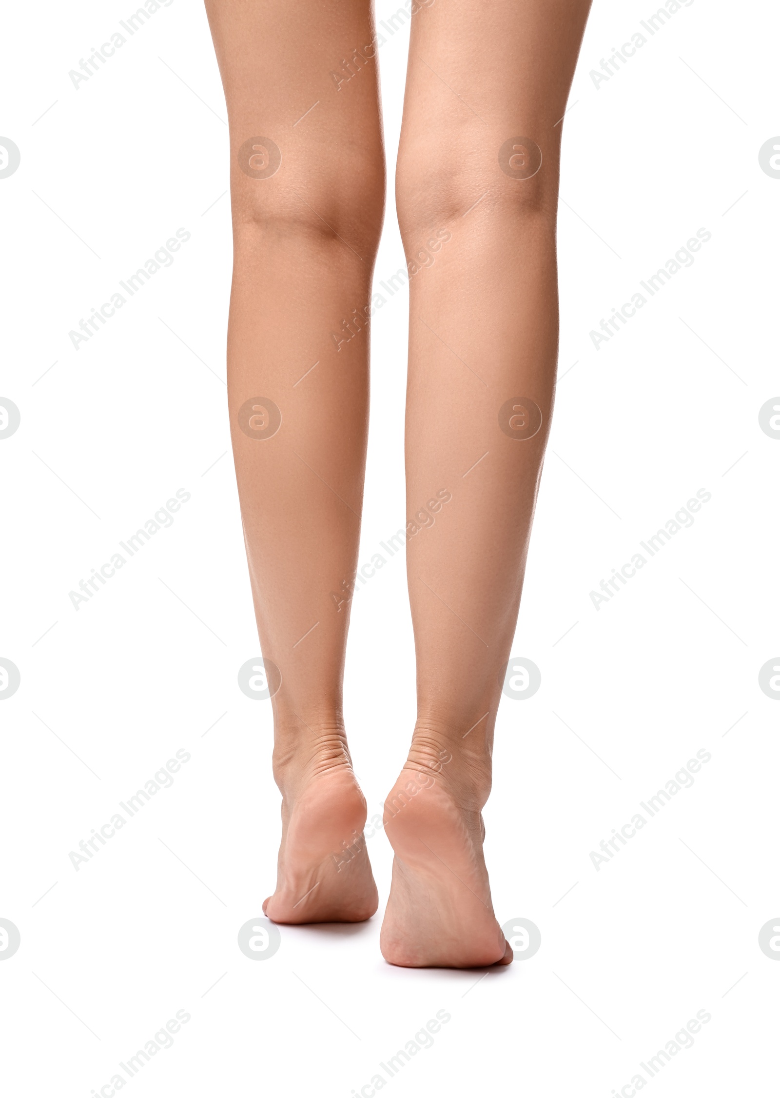 Photo of Woman with smooth legs on white background, closeup