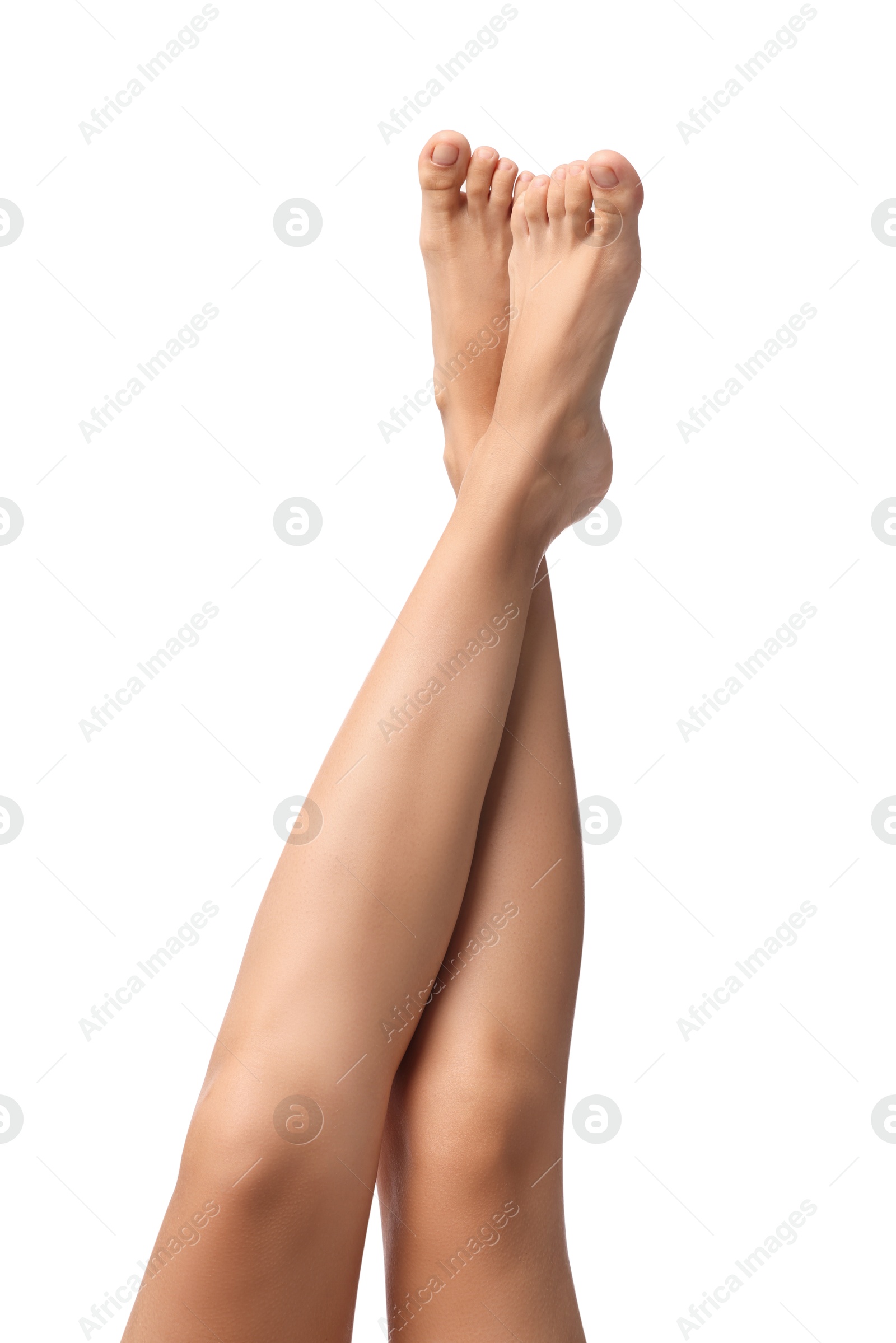 Photo of Woman with smooth legs on white background, closeup