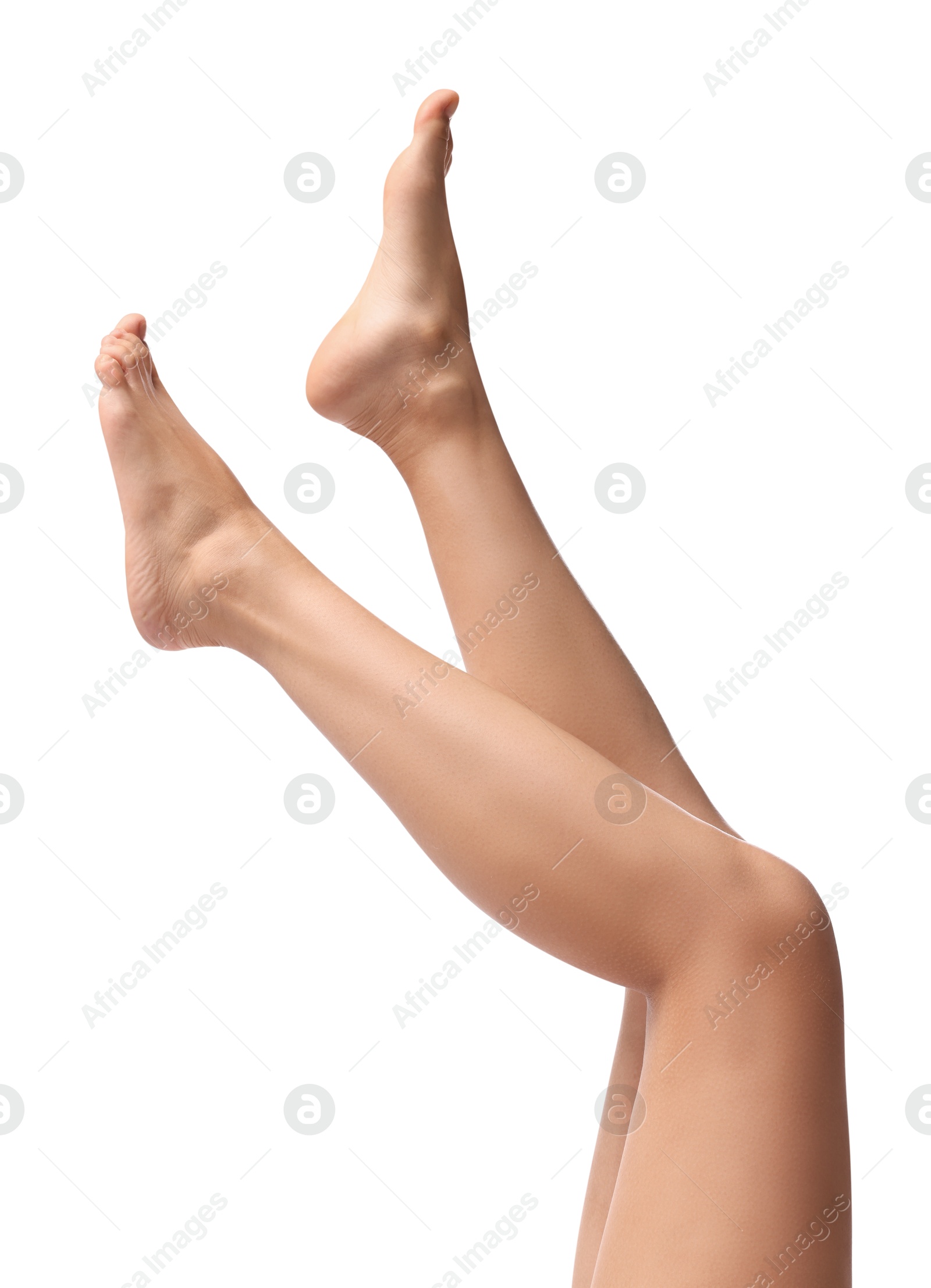 Photo of Woman with smooth legs on white background, closeup