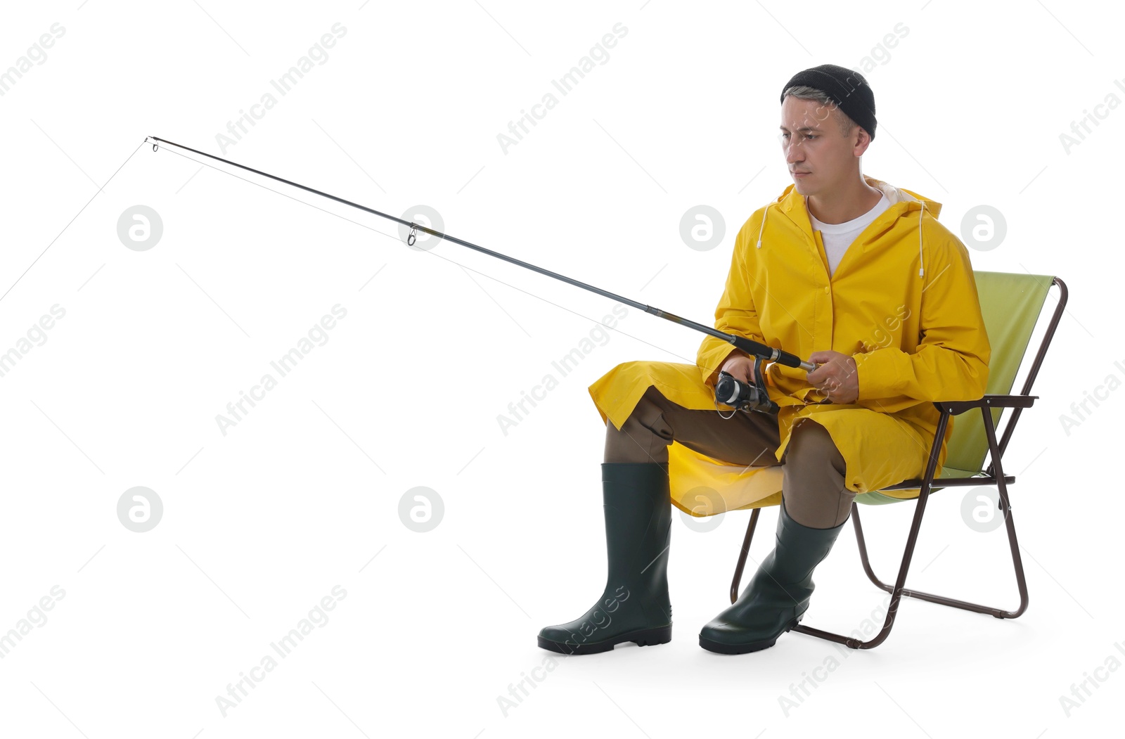 Photo of Fisherman with rod on fishing chair against white background