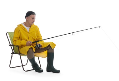 Fisherman with rod on fishing chair against white background