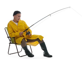 Fisherman with rod on fishing chair against white background