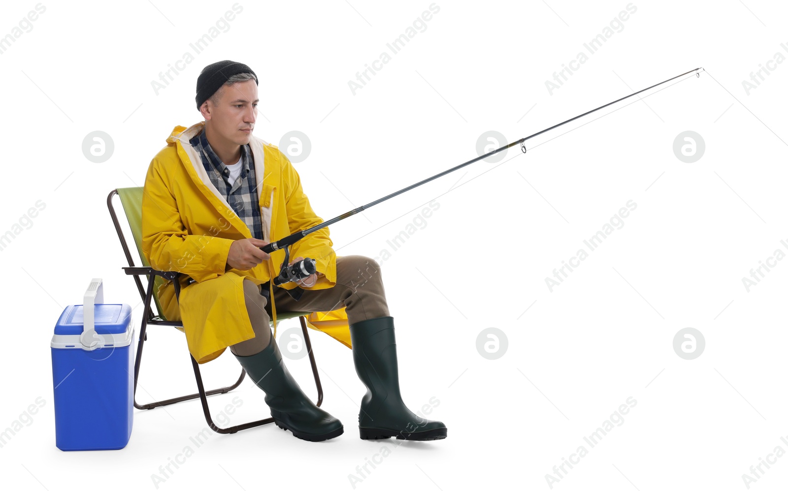 Photo of Fisherman with rod on fishing chair near cooler box against white background