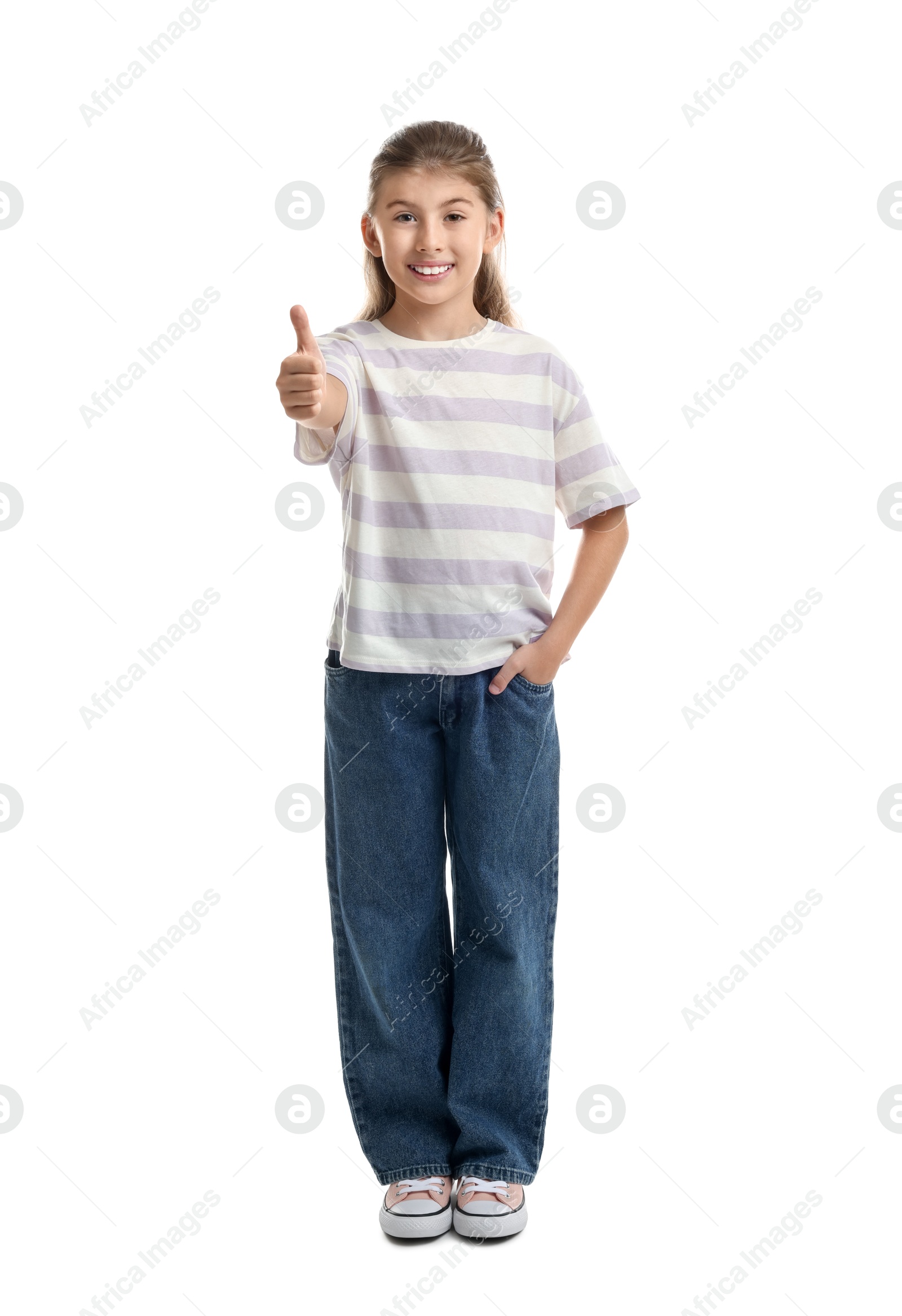 Photo of Cute girl showing thumbs up on white background