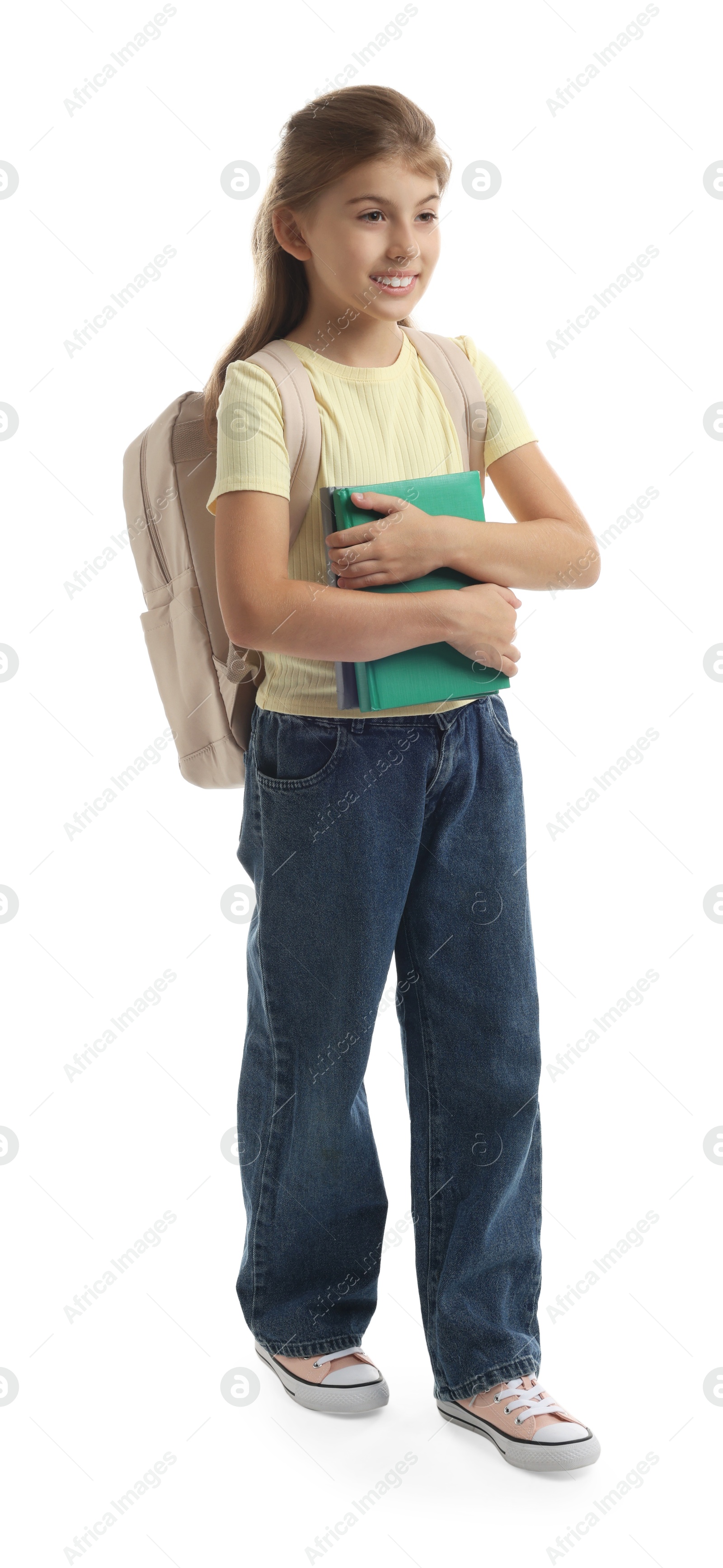 Photo of Girl with backpack and books on white background