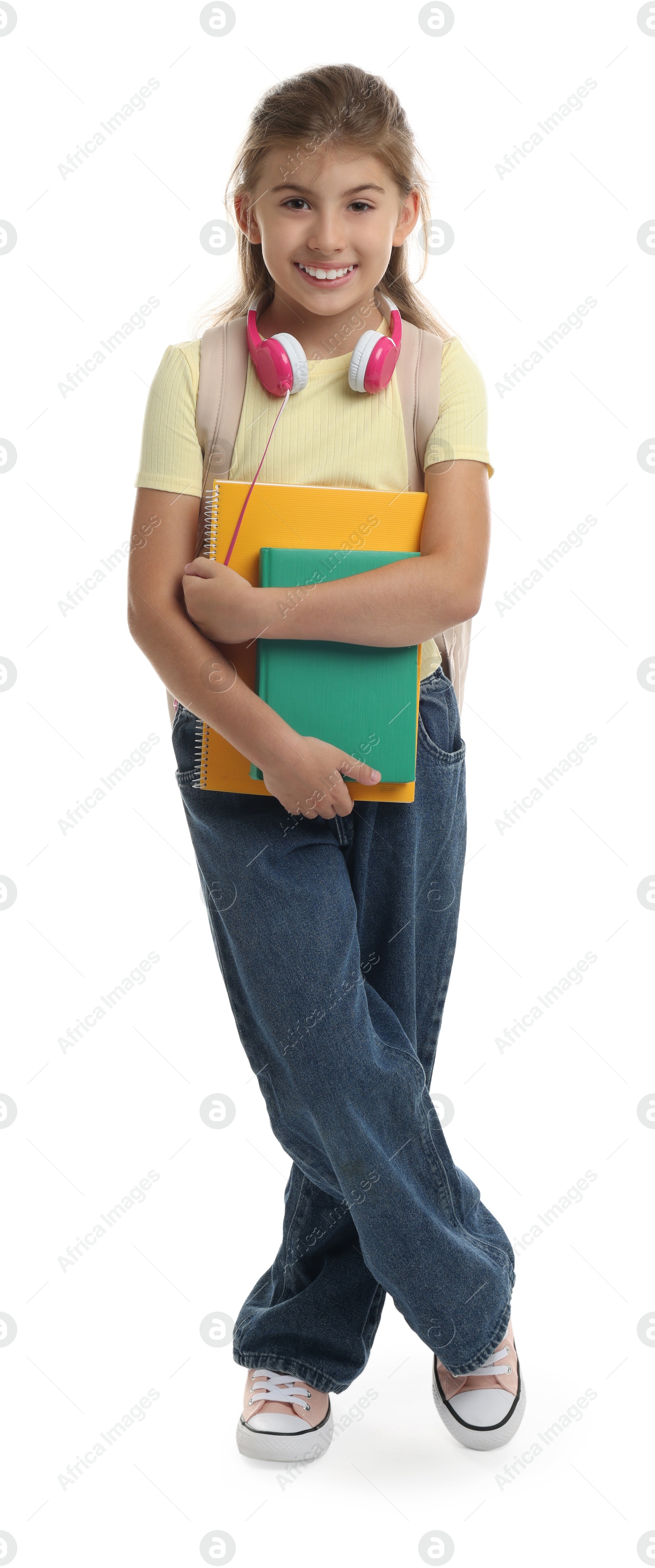 Photo of Girl with backpack and books on white background