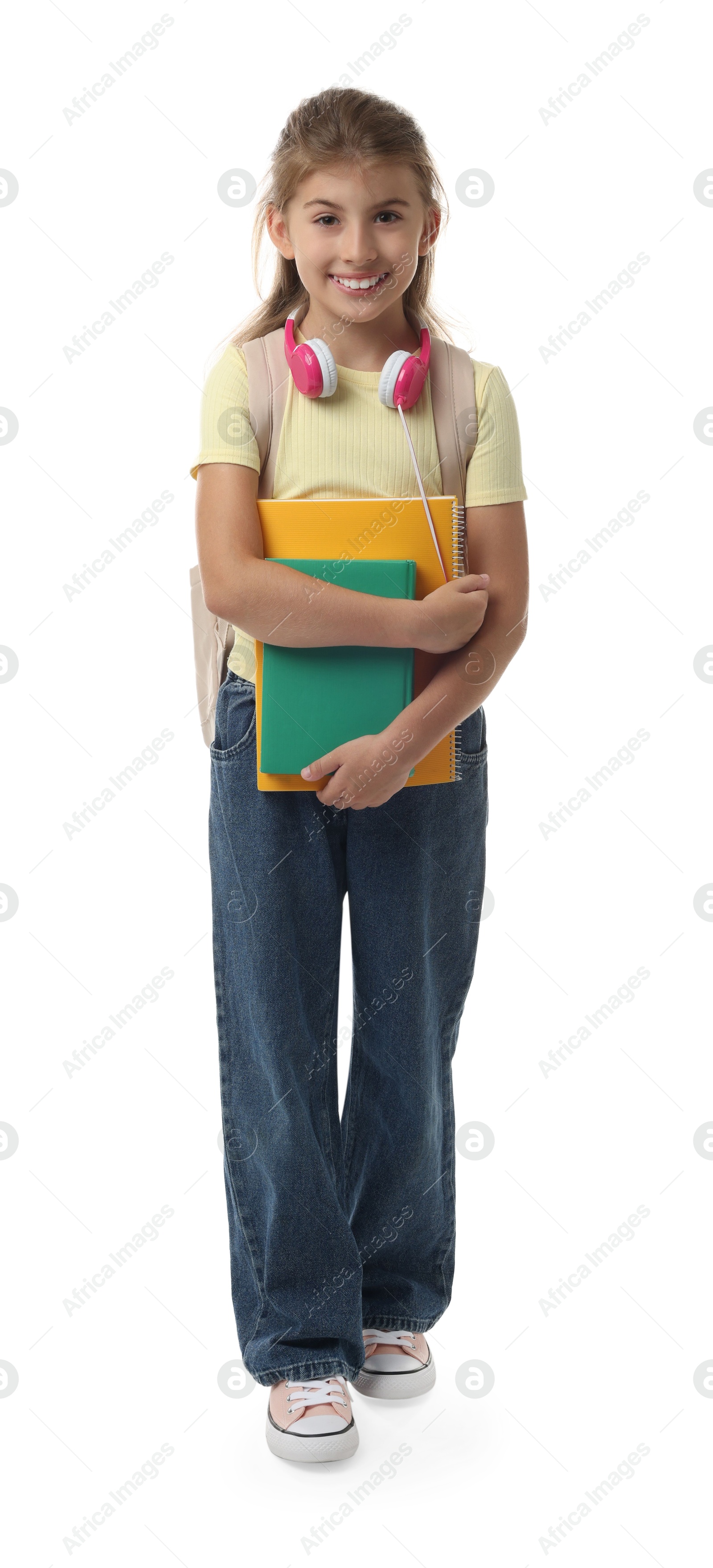 Photo of Girl with backpack and books on white background