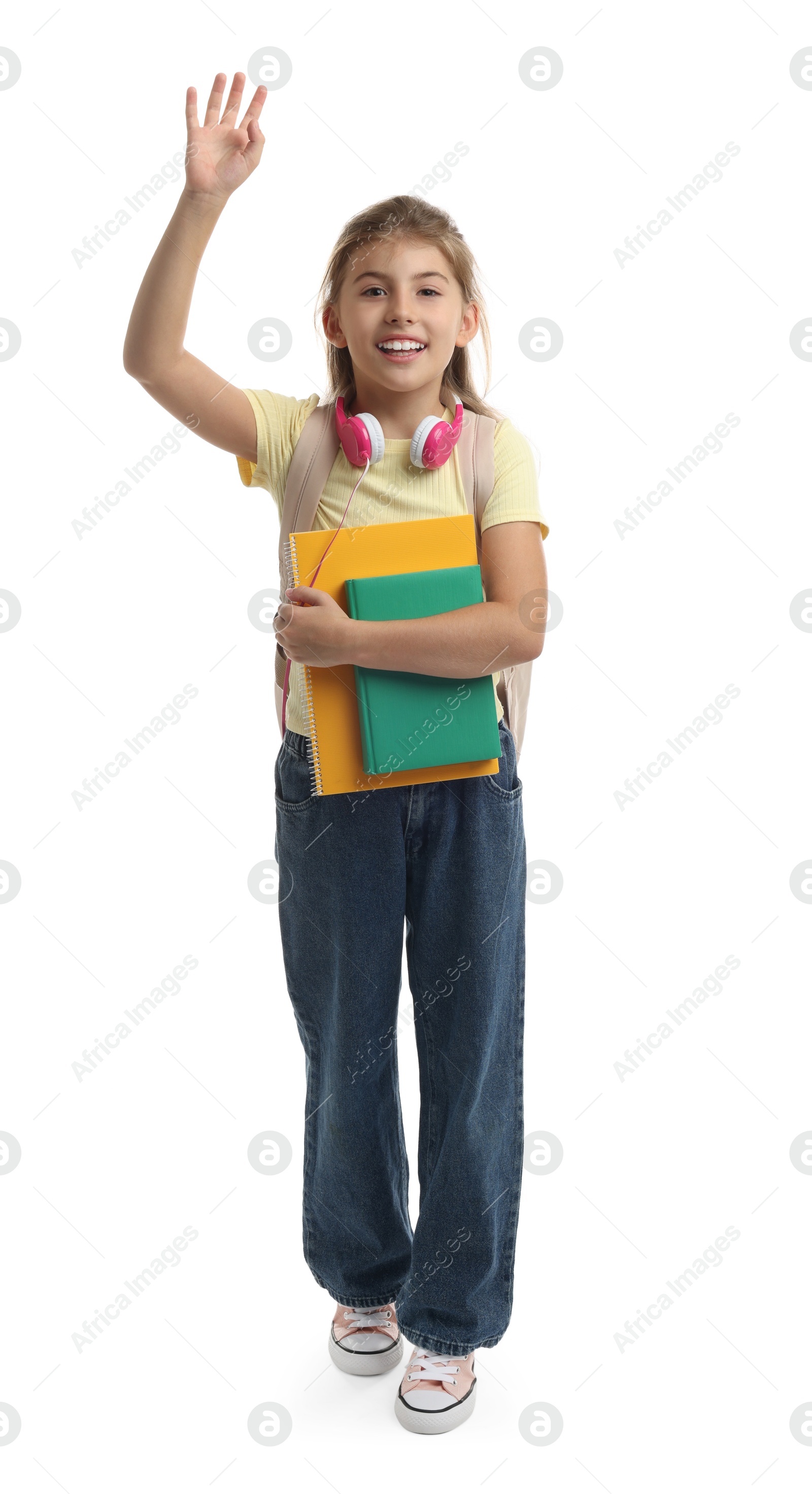 Photo of Girl with backpack and books on white background