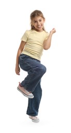 Photo of Cute positive girl dancing on white background