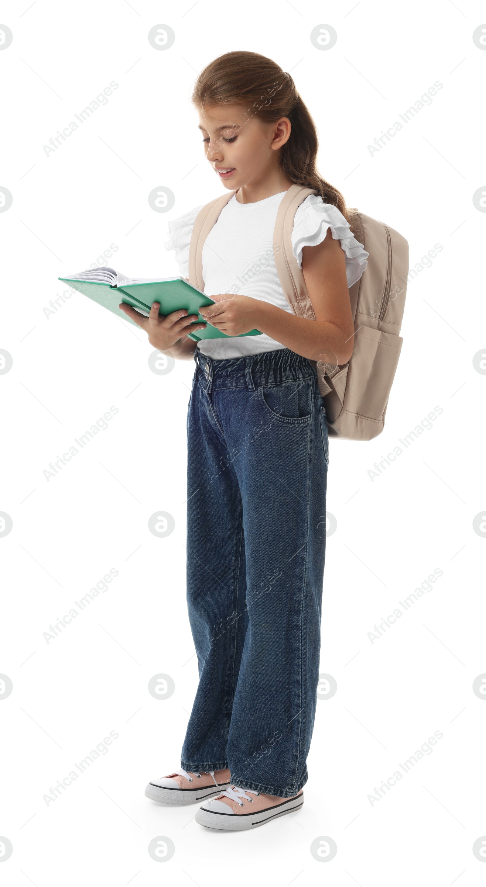 Photo of Girl with backpack and book on white background