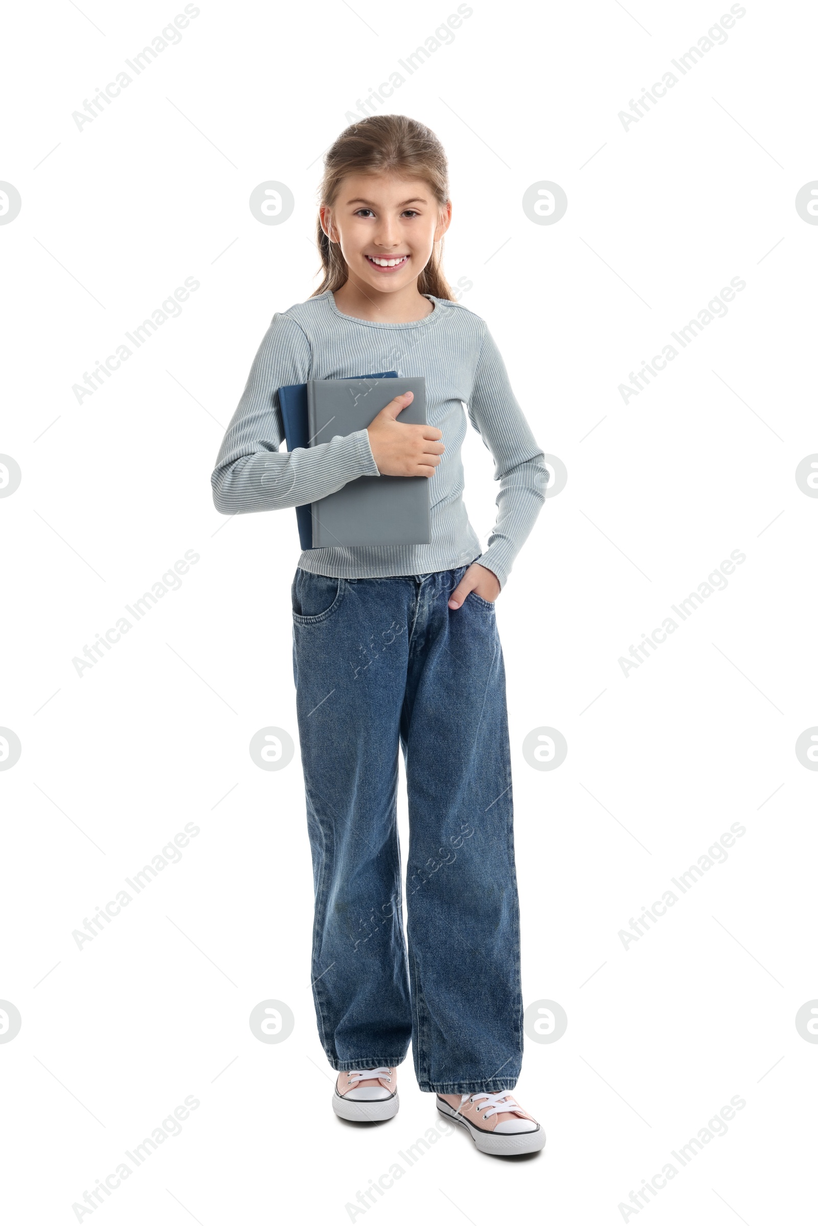 Photo of Positive girl with books on white background