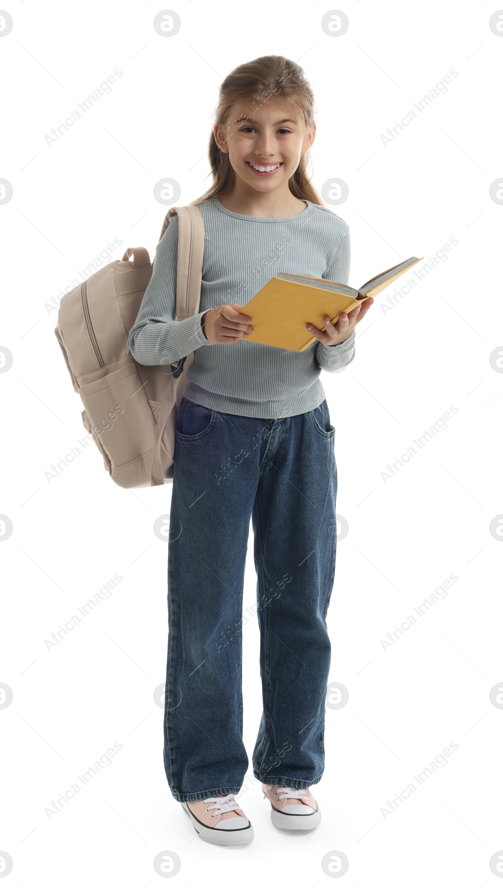 Photo of Girl with backpack and book on white background