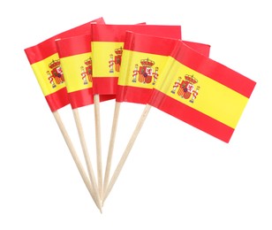 Small paper flags of Spain isolated on white