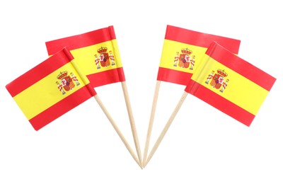 Photo of Small paper flags of Spain isolated on white