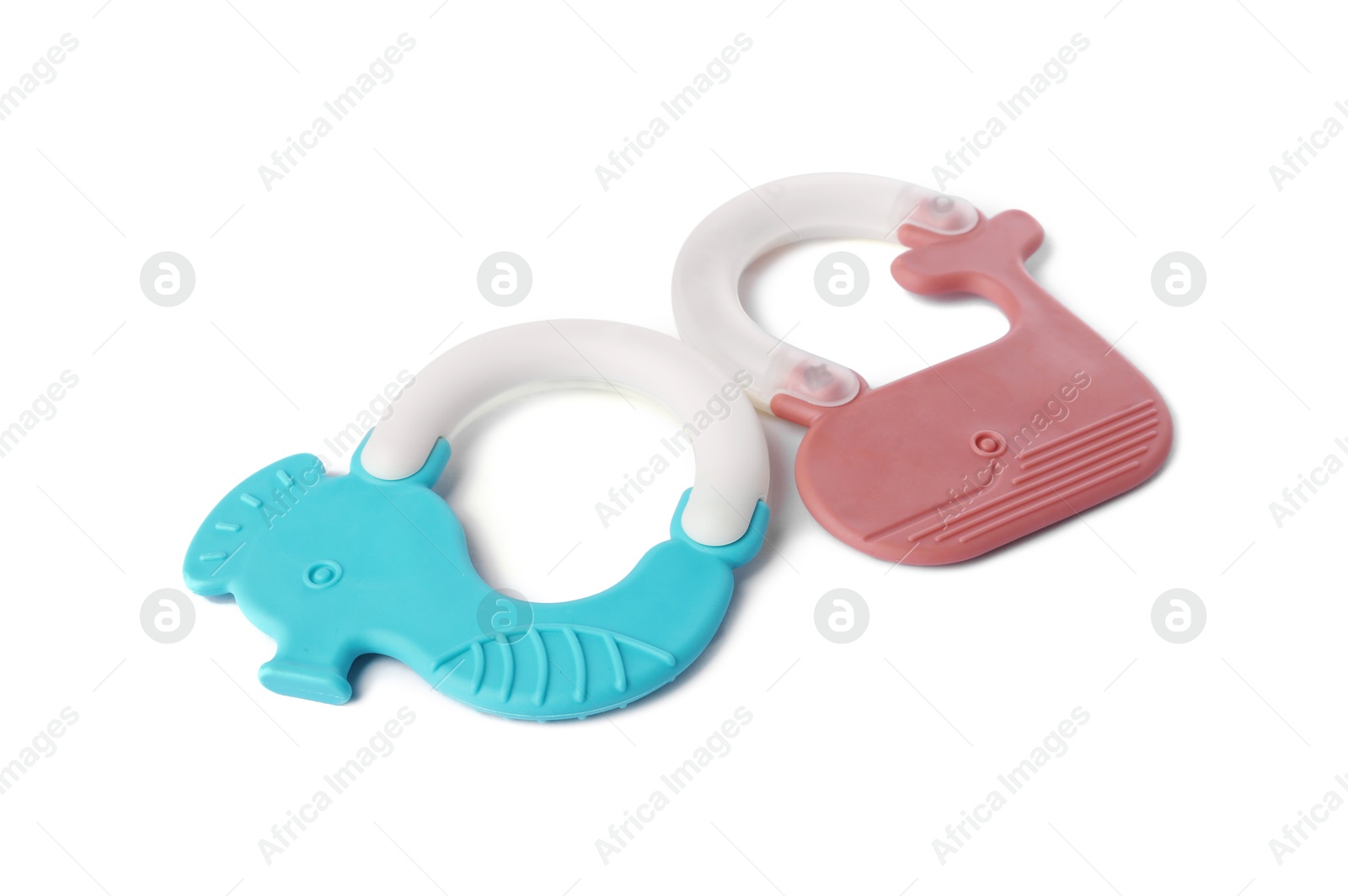 Photo of Colorful rattles isolated on white. Baby accessories