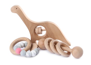 Photo of Wooden rattles isolated on white. Baby accessories