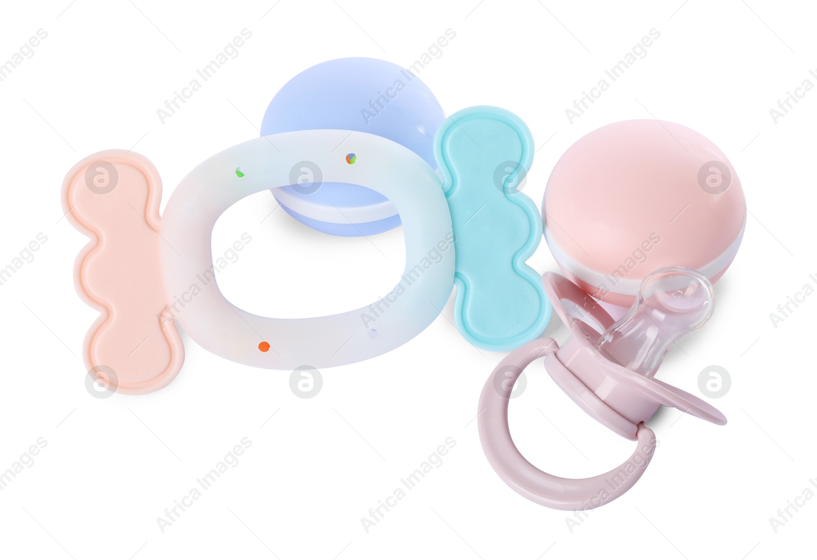 Photo of Colorful rattles and pacifier isolated on white. Baby accessories