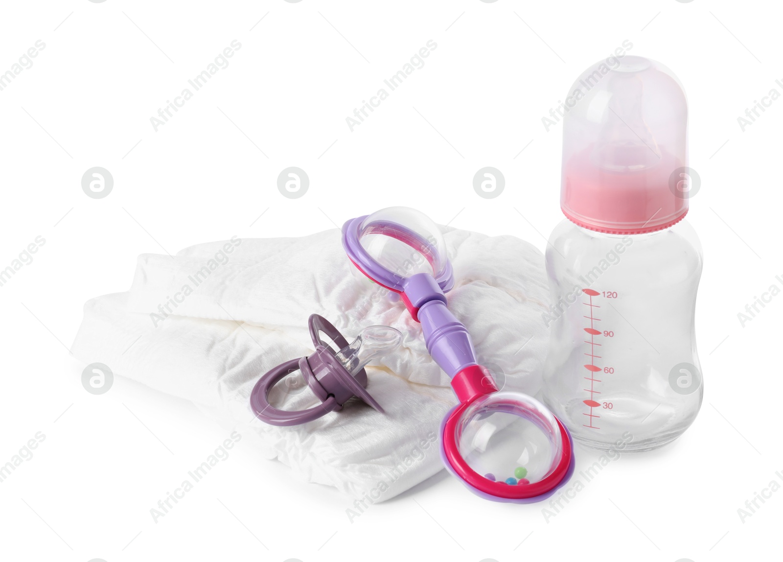 Photo of Colorful rattle, diapers, bottle and pacifier isolated on white. Baby accessories