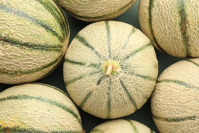 Photo of Many ripe Cantaloupe melons as background, top view