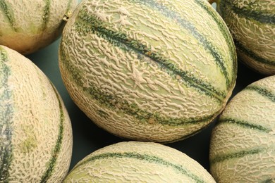 Photo of Many ripe Cantaloupe melons as background, top view