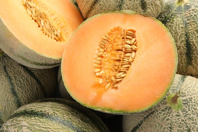 Photo of Many ripe Cantaloupe melons as background, closeup