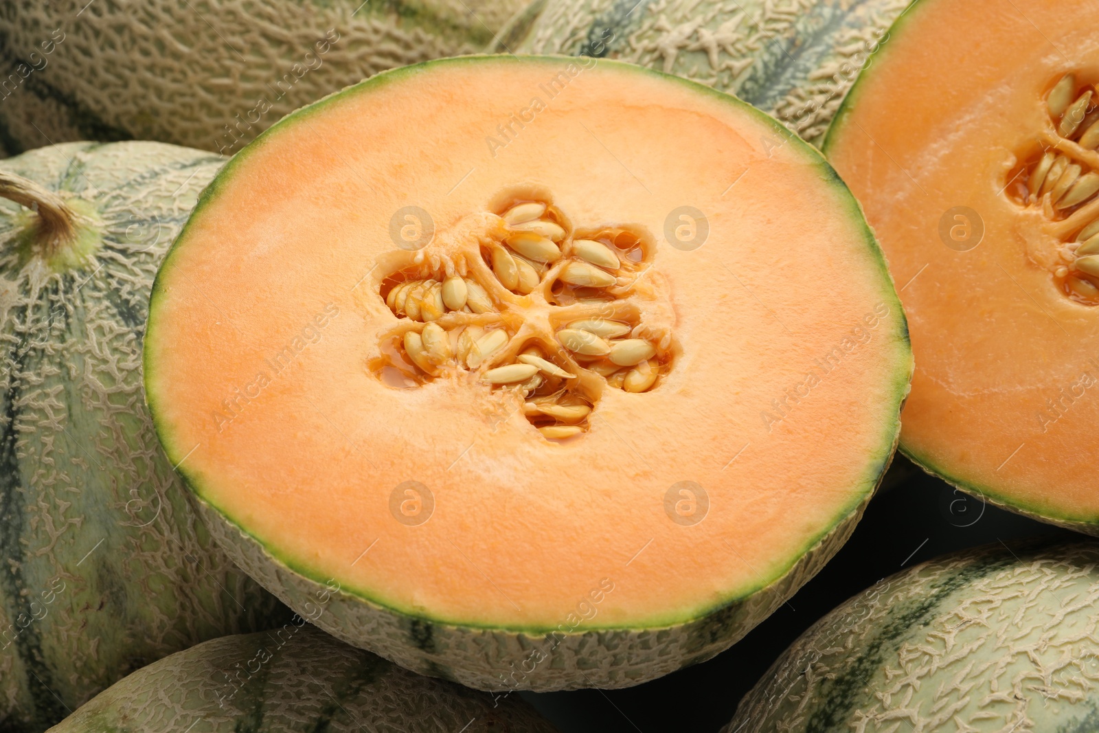 Photo of Many ripe Cantaloupe melons as background, closeup