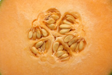 Photo of Cut Cantaloupe melon as background, top view