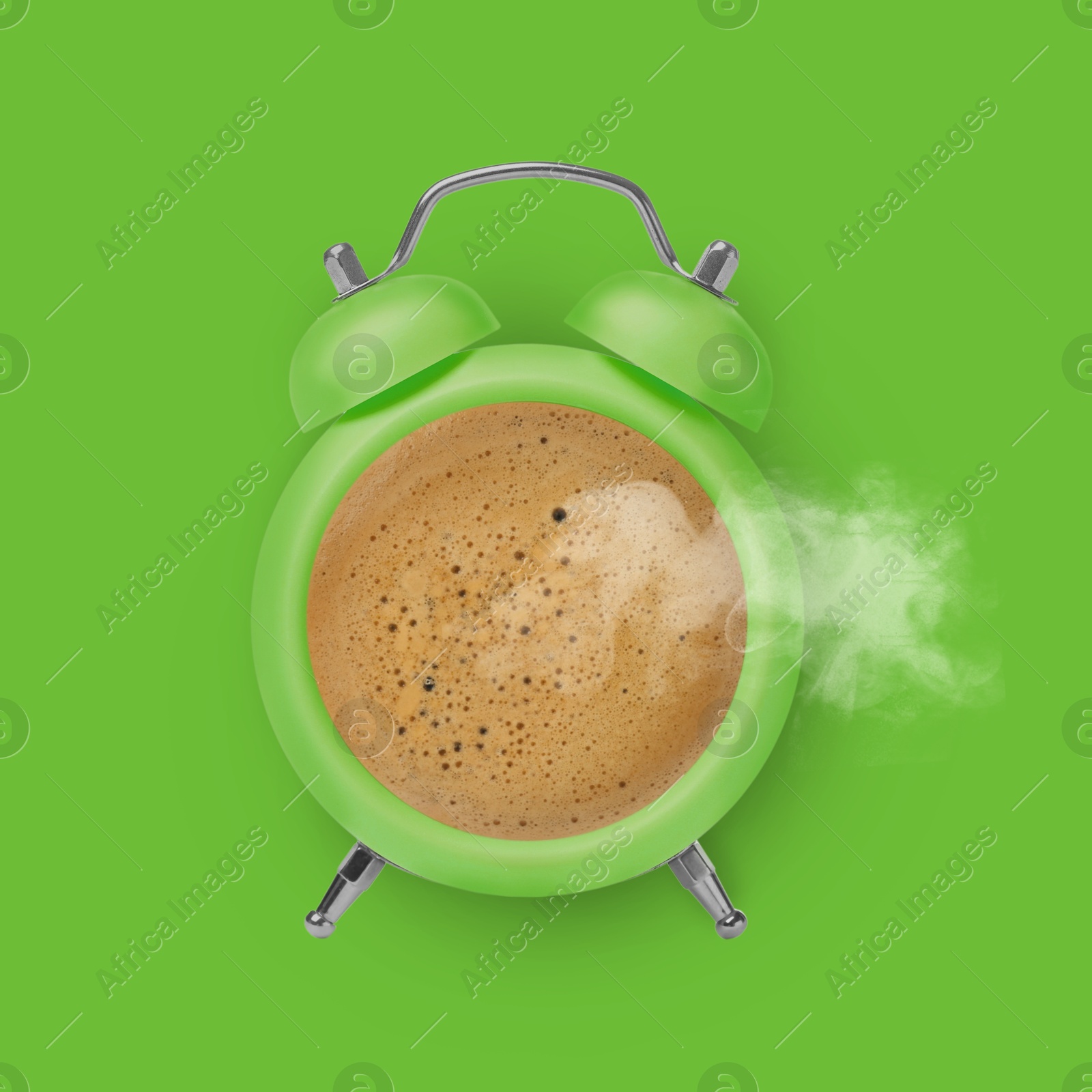 Image of Bright alarm clock with coffee instead of dial on green background, top view