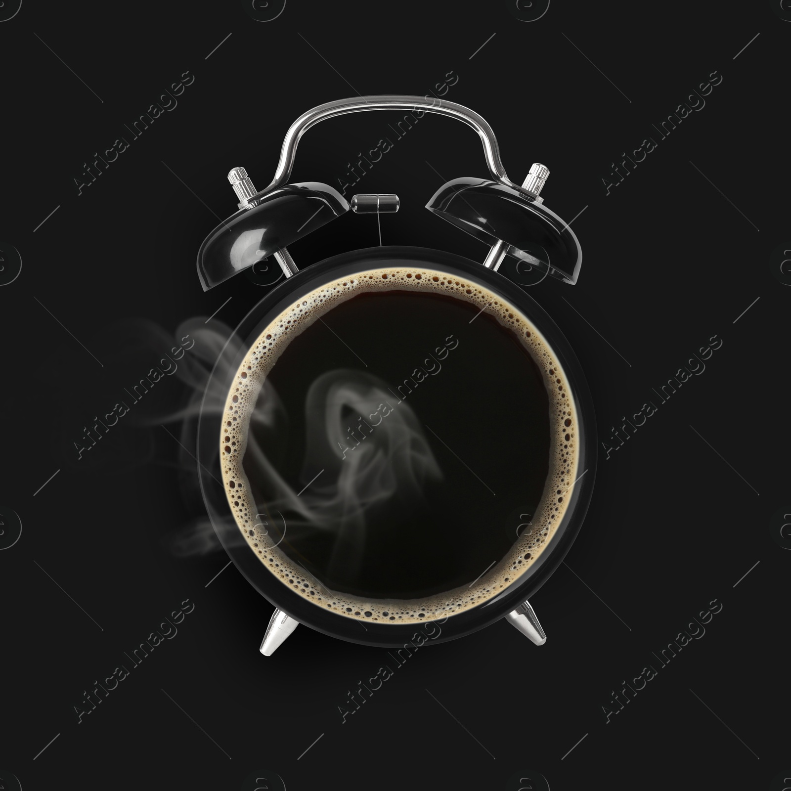 Image of Alarm clock with coffee instead of dial on black background, top view