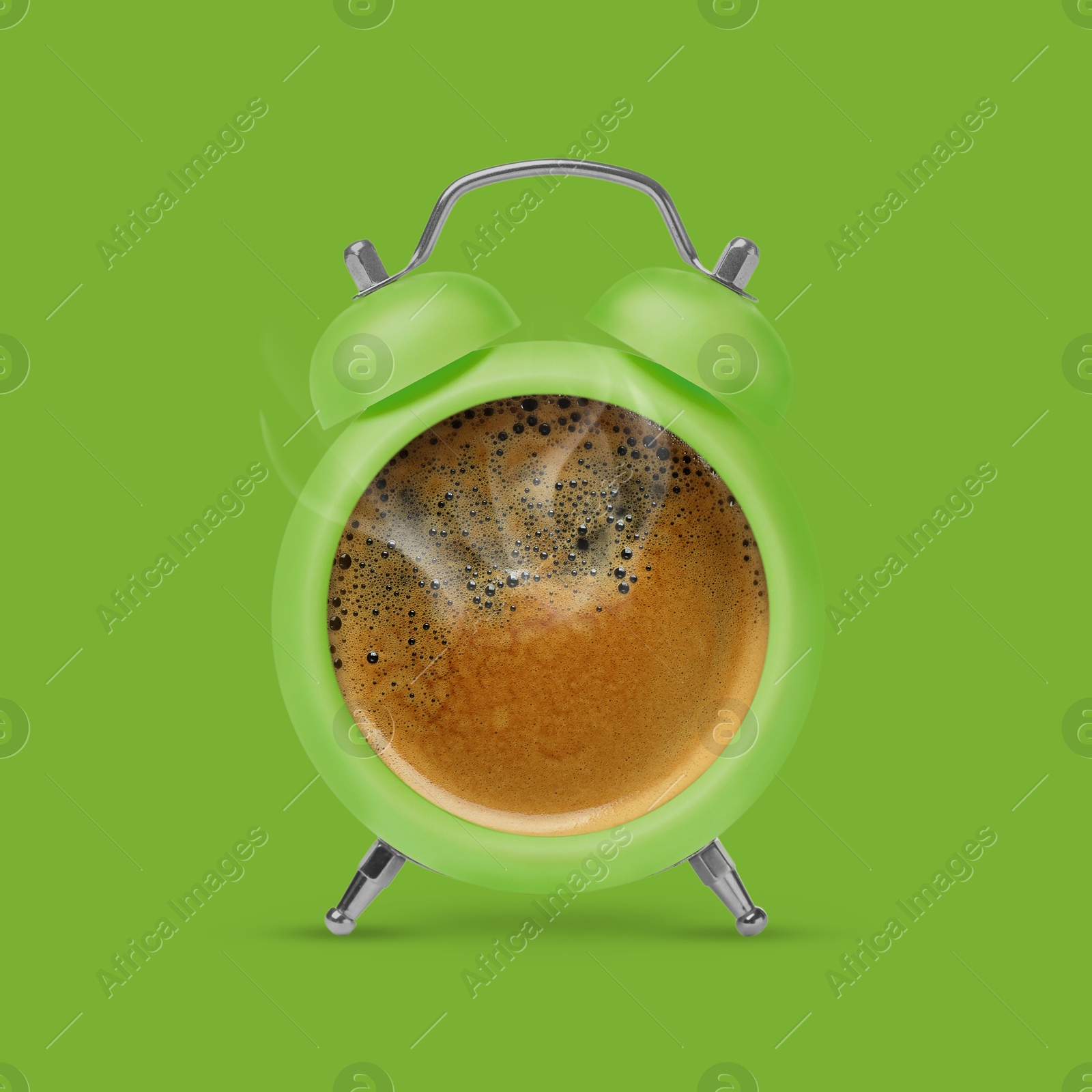 Image of Bright alarm clock with coffee instead of dial on green background