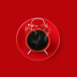 Image of Bright alarm clock with coffee instead of dial on red background, top view