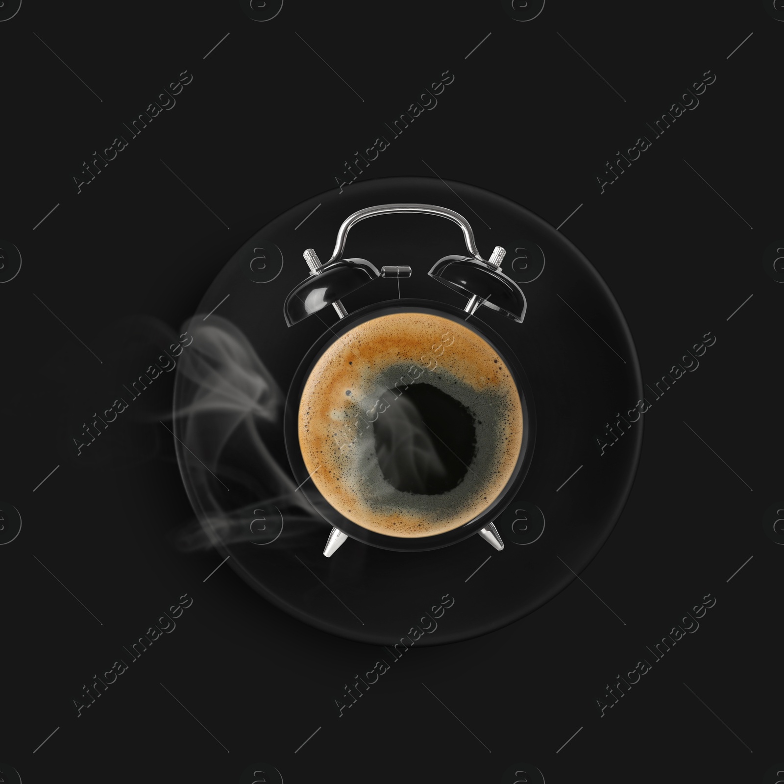 Image of Alarm clock with coffee instead of dial on black background, top view