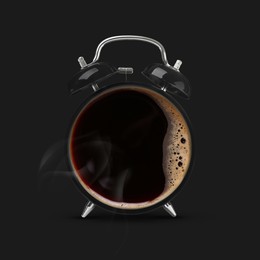 Image of Alarm clock with coffee instead of dial on black background