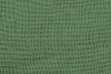 Image of Sage color burlap fabric as background, closeup