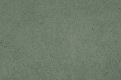 Image of Sage color parchment paper as background, closeup of texture