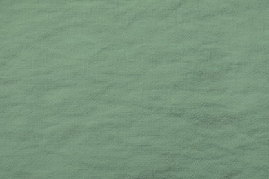 Image of Sage color fabric as background, top view