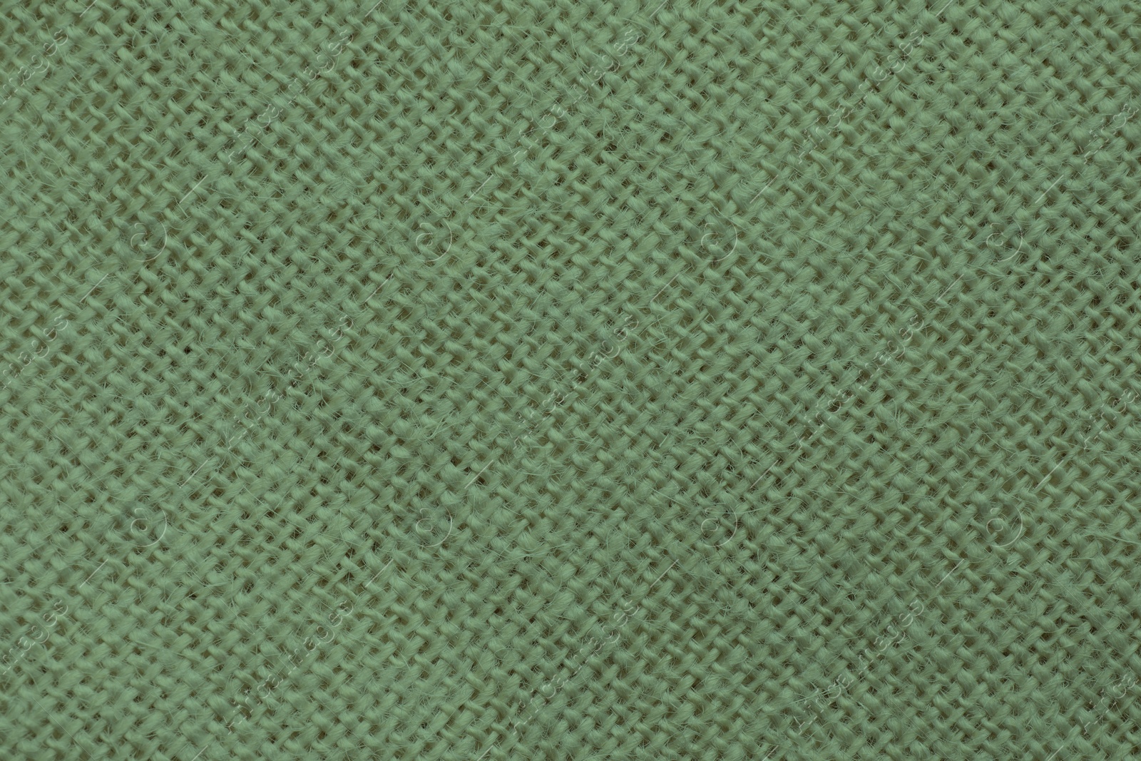 Image of Sage color fabric as background, top view