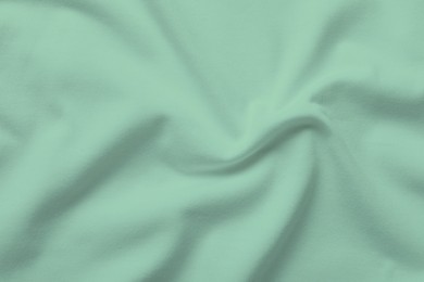 Image of Sage color fabric as background, top view