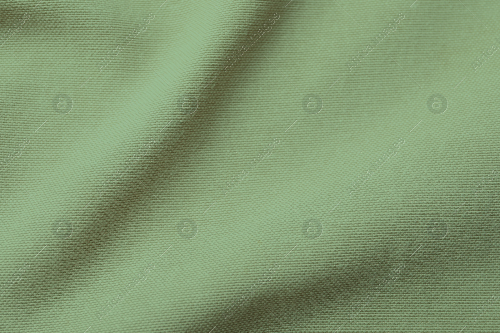 Image of Sage color fabric as background, top view