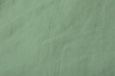 Image of Sage color fabric as background, top view